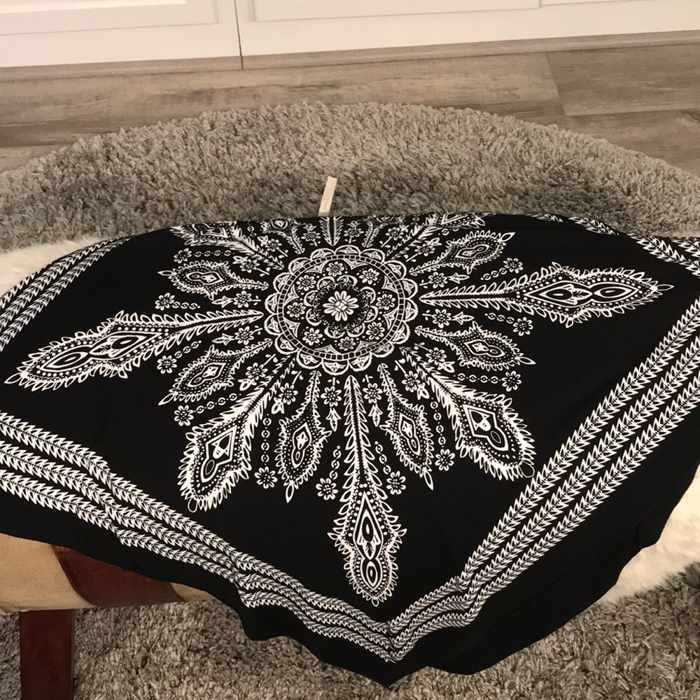 Handkerchief style with pee-a-boo arms